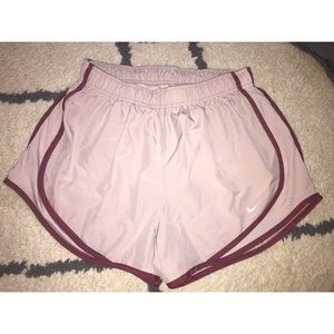 Pink Nike dri-fit running shorts